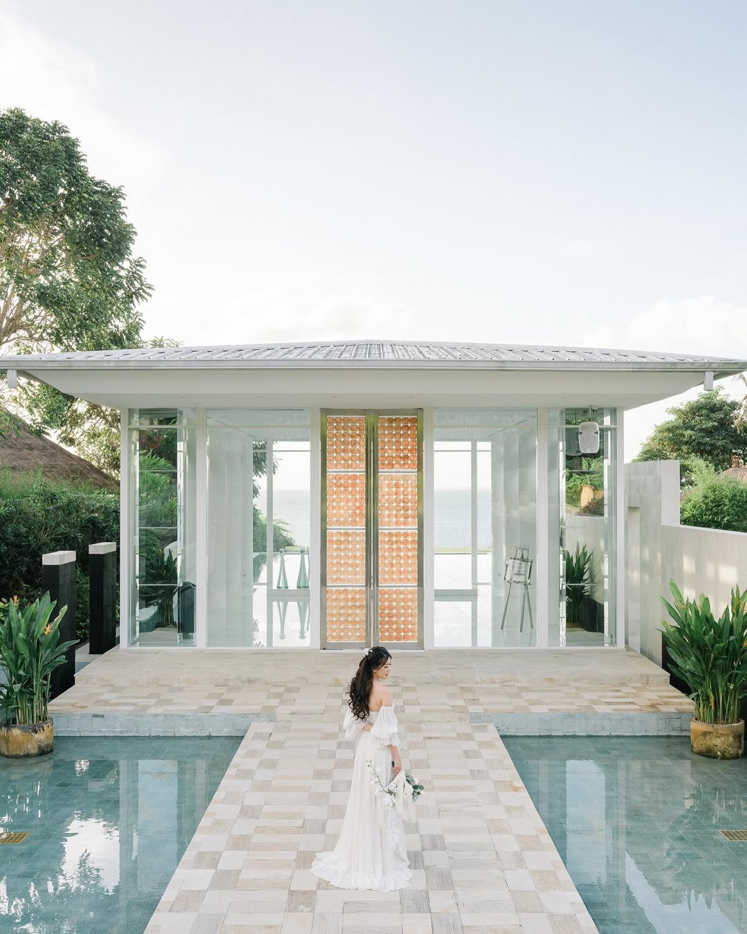Modern glass chapel at Ayana Resort, perfect for an elegant Bali island wedding ceremony by the sea.