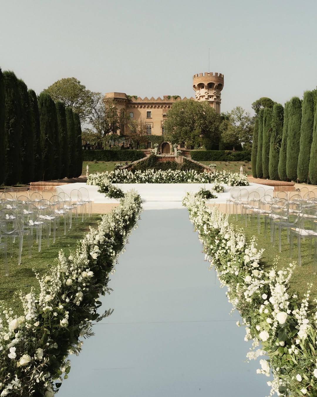 Elegant garden ceremony at Castell de Sant MarΓ§al, a fairytale castle setting among the best Barcelona wedding venues.