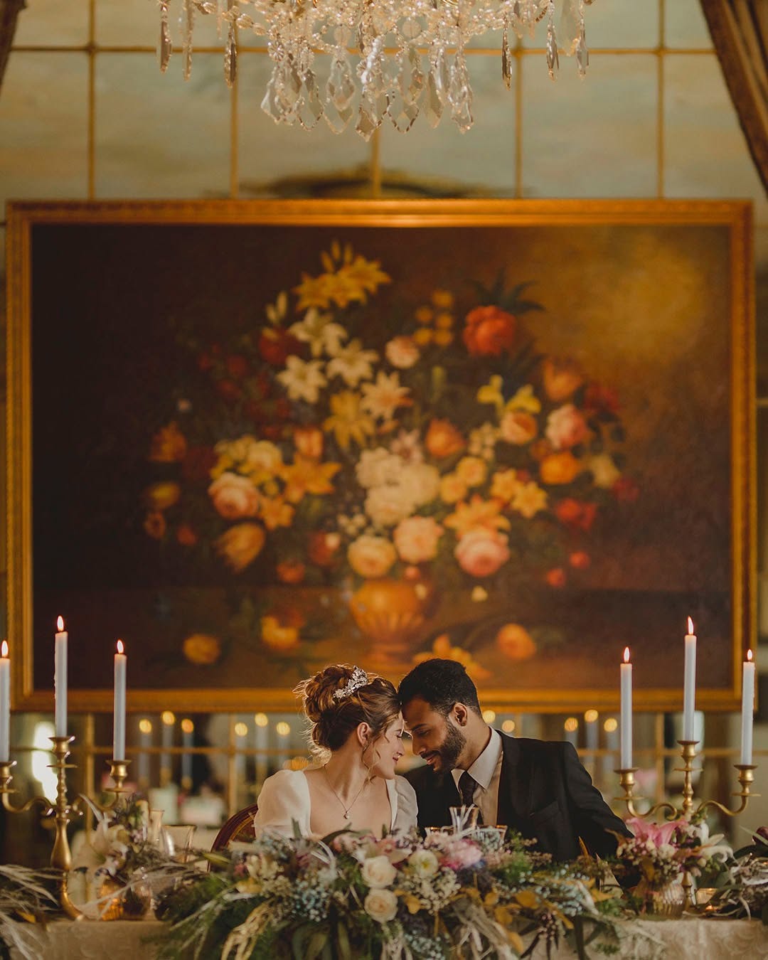 Bride and groom sharing a moment in a regal setting at El Palace Hotel, an iconic luxury choice among Barcelona wedding venues.