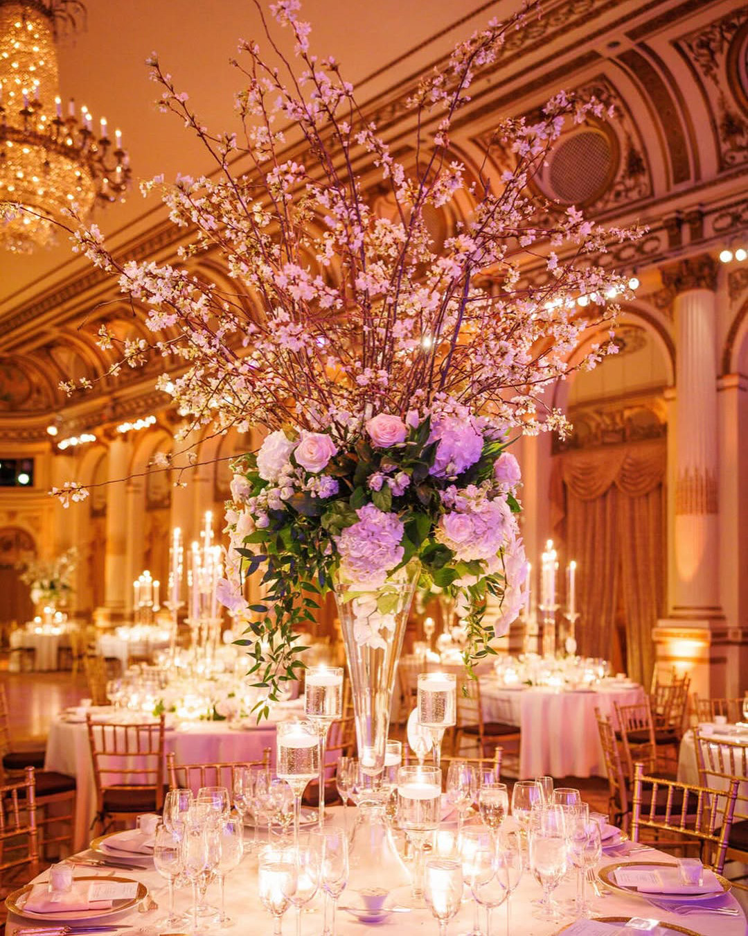 The Plaza Hotel wedding venue in New York City with opulent chandeliers, classical architecture, and lavish floral arrangements for grand events.