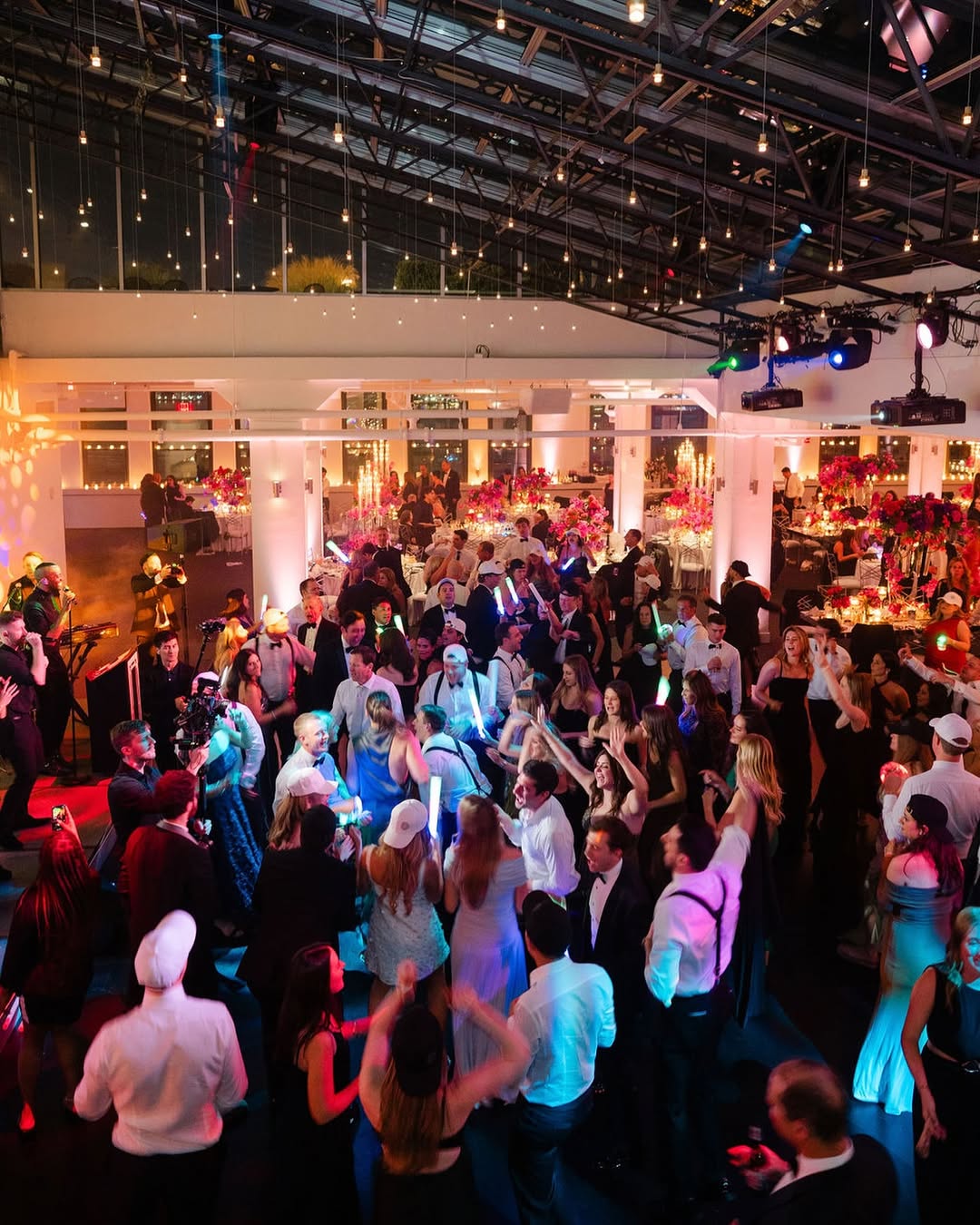 Tribeca Rooftop wedding venue in New York City with a lively atmosphere, rooftop views, and vibrant lighting for unforgettable receptions.