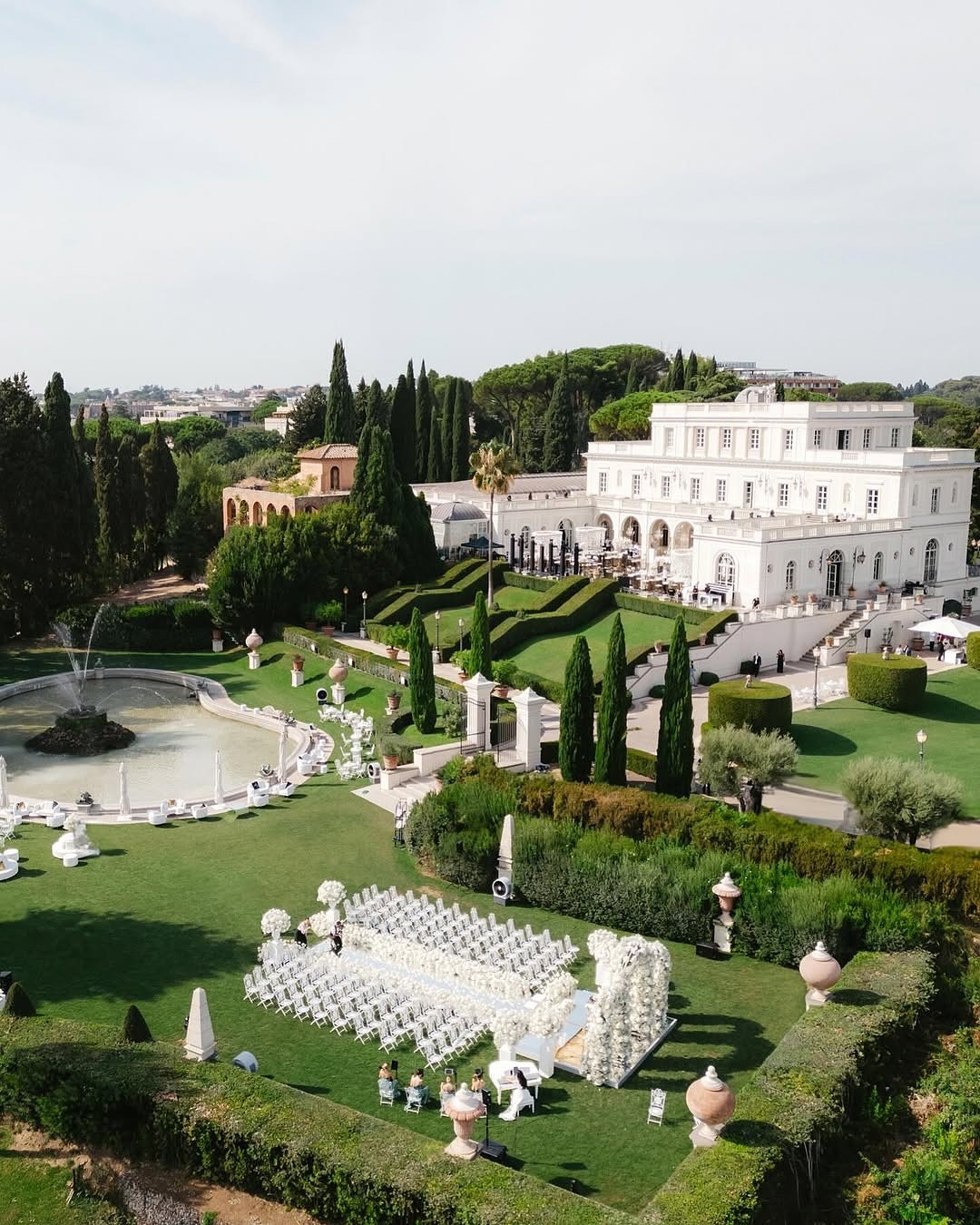 Panoramic view of Villa Miani in Rome with pristine lawns and ceremonial setup, a prestigious choice for Rome wedding venues with scenic backdrops.